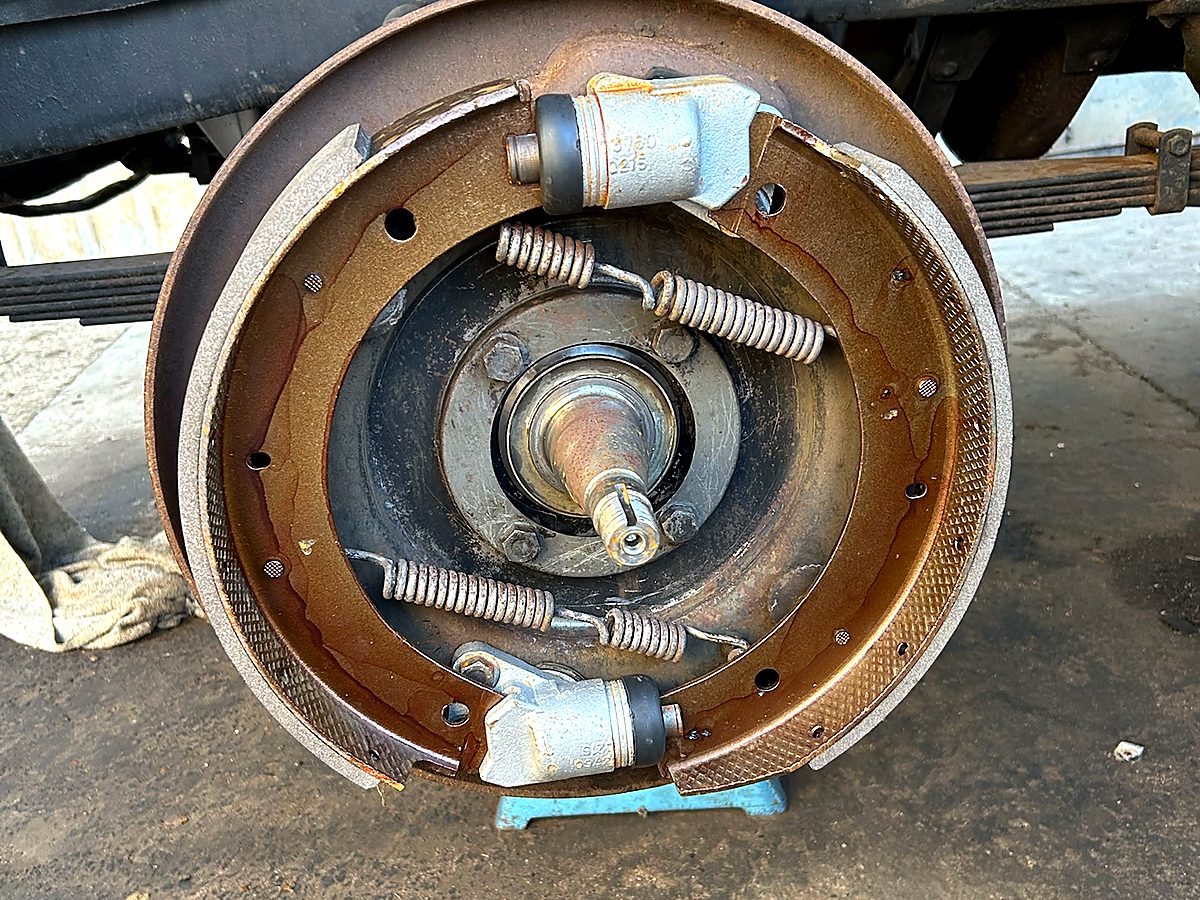 Heavy-vehicle drum brake with shoes and wheel cylinders exposed during a brake overhaul at Naturaliste Diesel Services