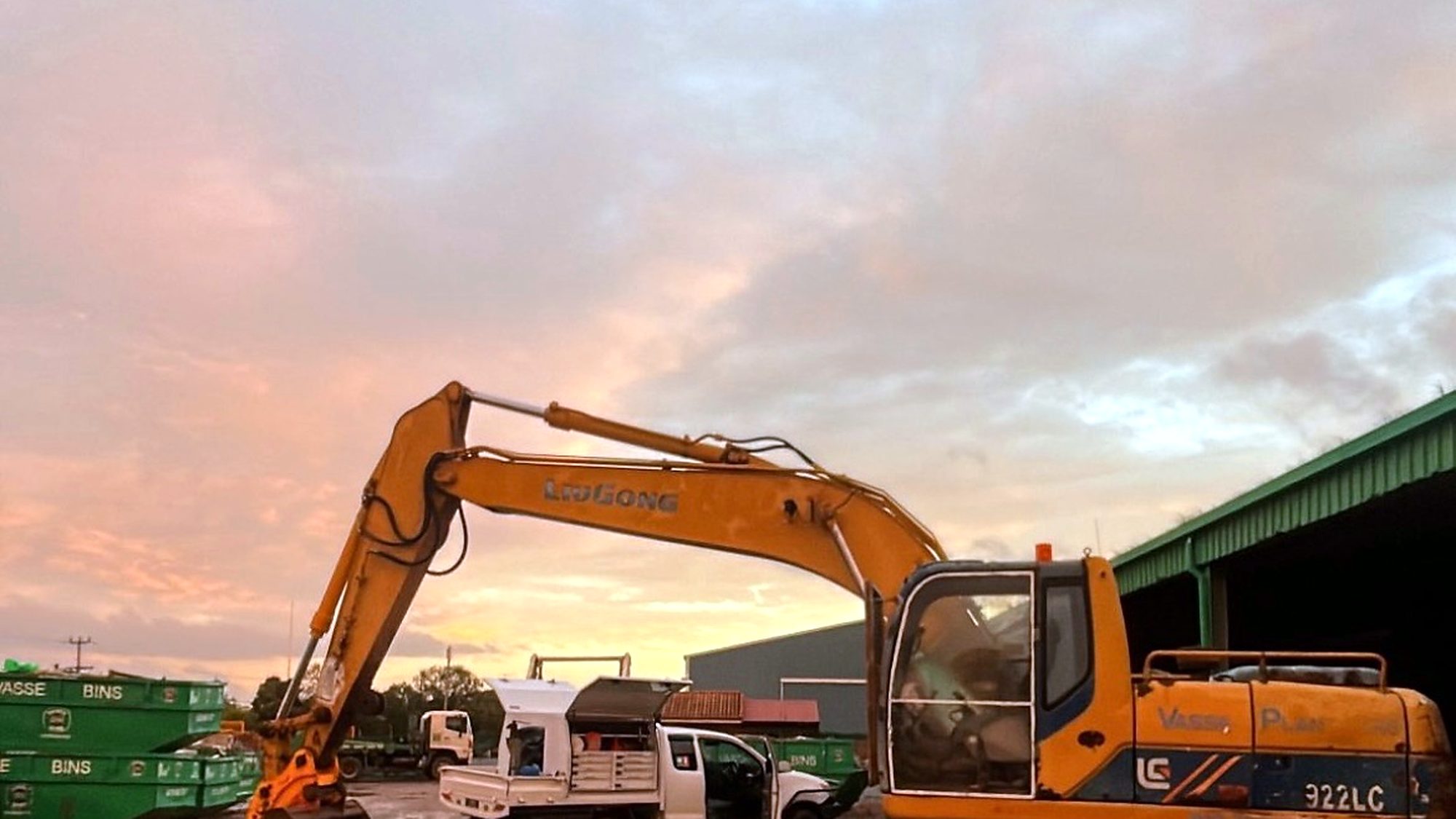 Excavator and heavy plant at a South West yard at dusk, serviced by Naturaliste Diesel Services